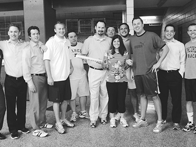 Dr. Sattler posing with coworkers from her time working in St. Louis Blues ticket sales